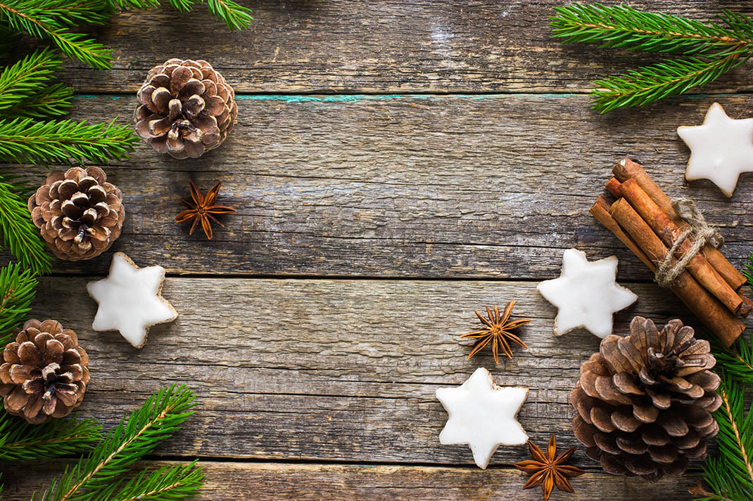 Christmas background with fir branches, pine cones, christmas co